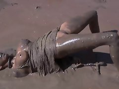 Young woman gets humiliated in the mud 1