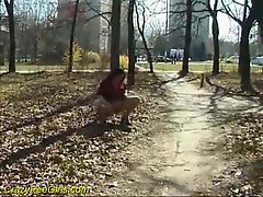 Filthy nympho with mega big melons pissing in a public park