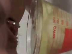 Dark haired slutty girl soaks her tampons in pee and drinks it