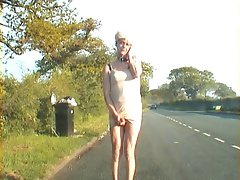Luscious transsexual nympho plays with erect shaft on the streets