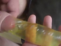 Cum into waterfilled condom under foreskin!!!