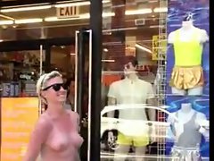 Female walking topless through NYC