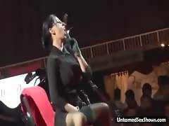 Dark haired stripper gets hre filthy body damp and plays on stage