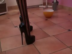 Luscious LADY CLEANS THE FLOOR IN HIGH HEELS FASHION CATSUIT