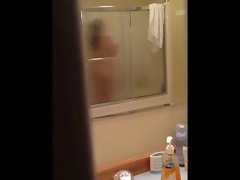 Aunt in the shower - door slightly opened