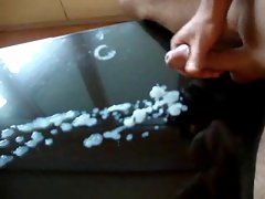 Cum on glass table