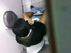 Asian fellow caught jacking off in the men's room