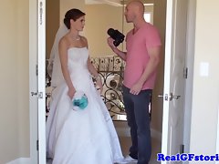 Charming bride facialized by her Photographer