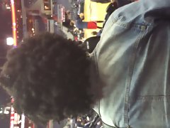 Attractive sensual ebony female with smoking filthy Afro hair