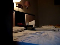 Chinese amateur couple in hotel