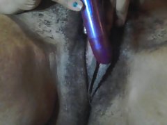amature dark skin young lady cums playing with chaos vibrater.