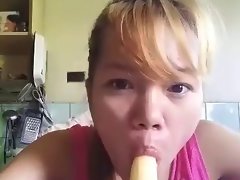 Filipina Bea licks banana and cream