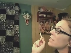 Hot black-haired gets a mouthhole of lewd jizz while smoking..